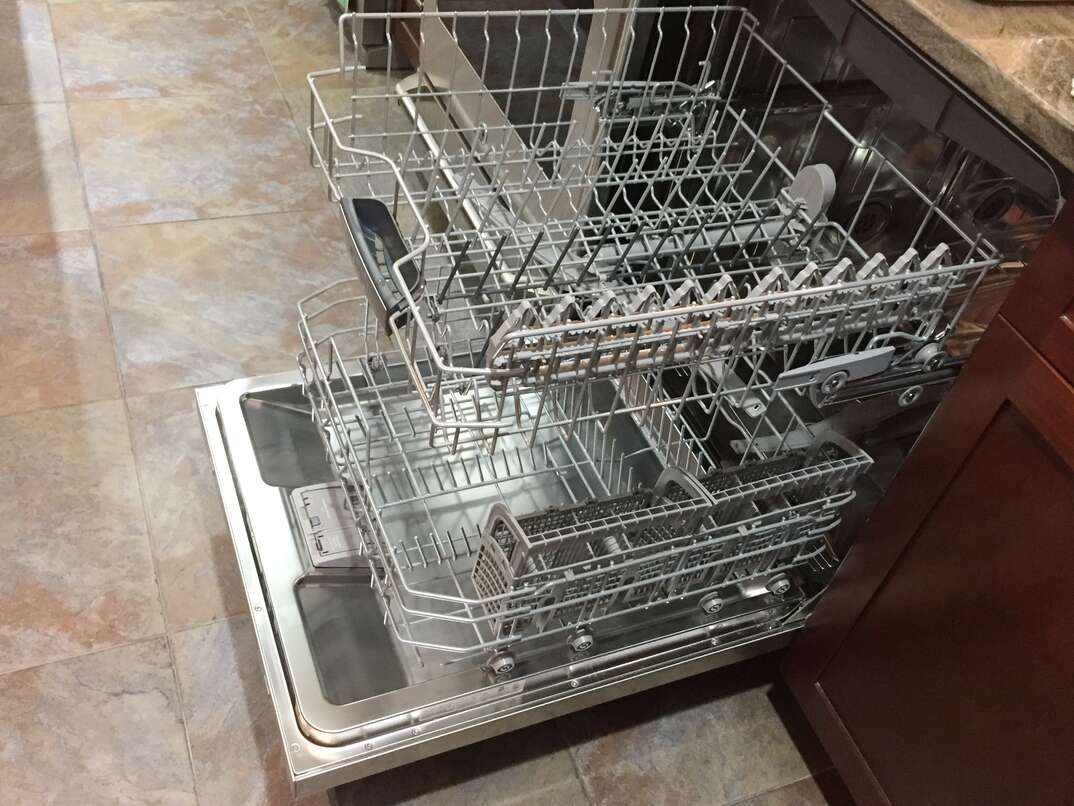 How to Put the Top Rack of a Dishwasher Back on Track