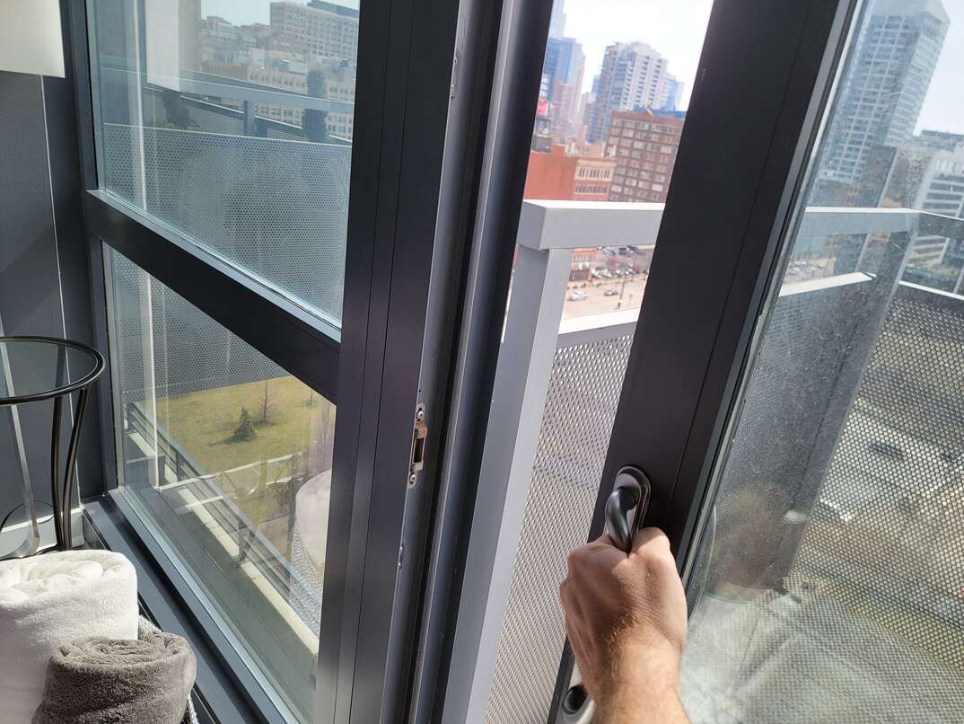 opening the window to a balcony