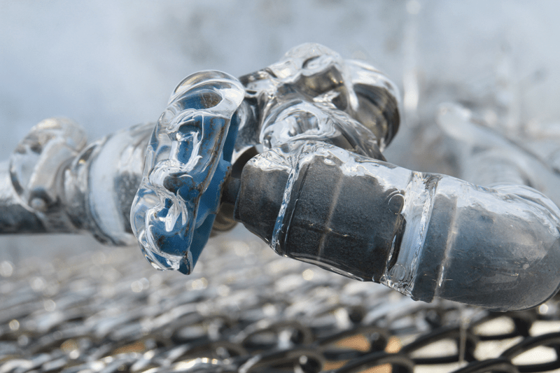 Close-Up Of Frozen Pipe