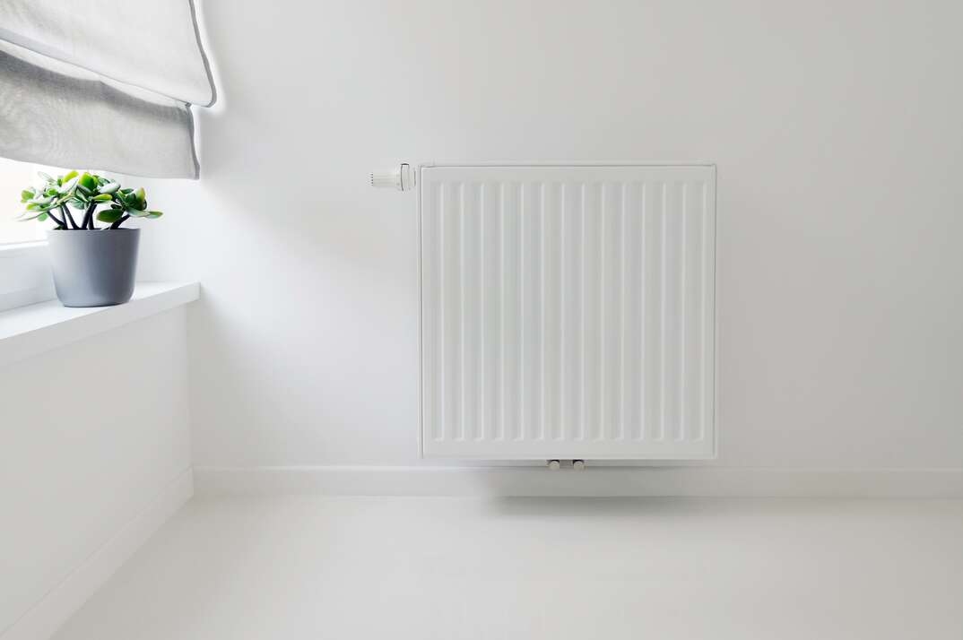 clean white room with radiator