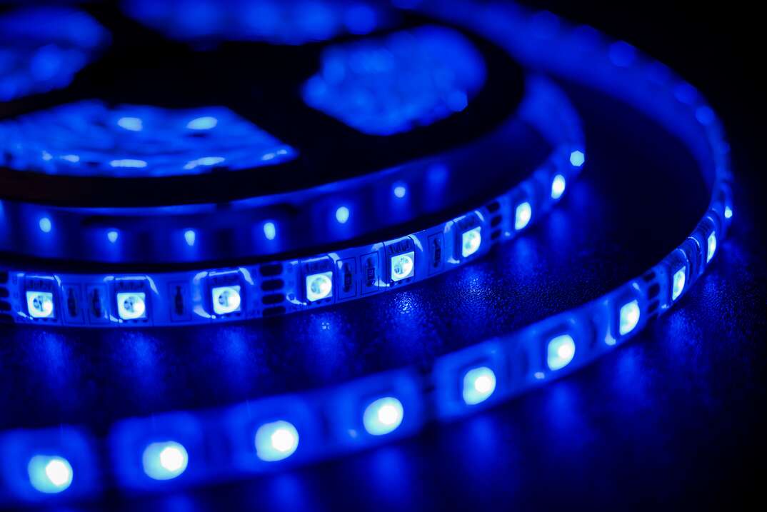 a coiled up and flexible blue LED light strip