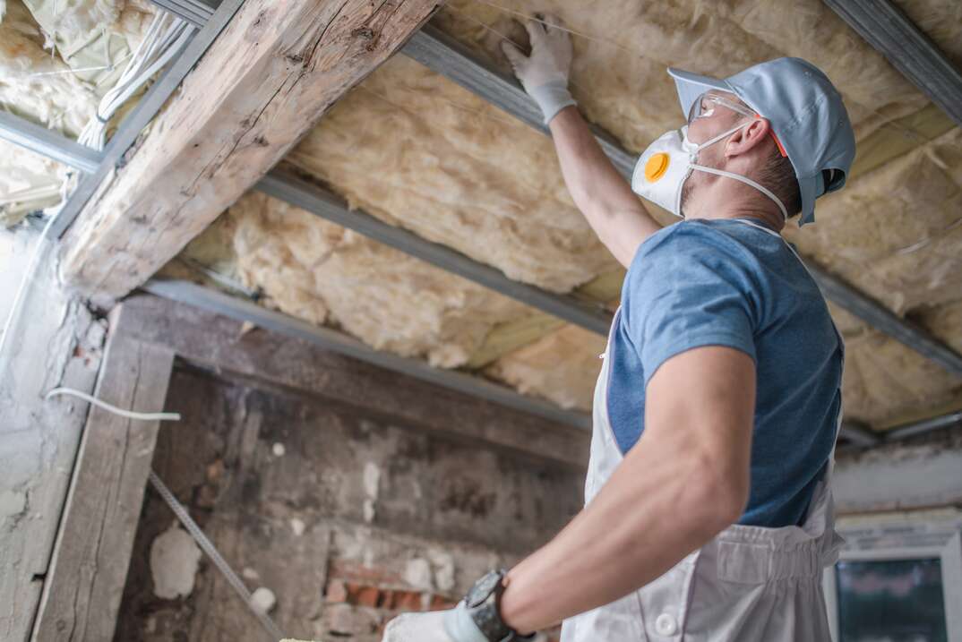 Replacing Old Attic Mineral Wool Insulation.