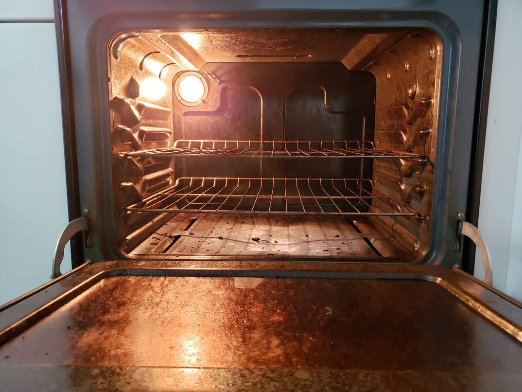 view inside a dirty oven