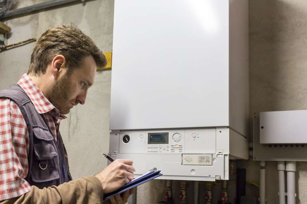 electrician looking at electrical box