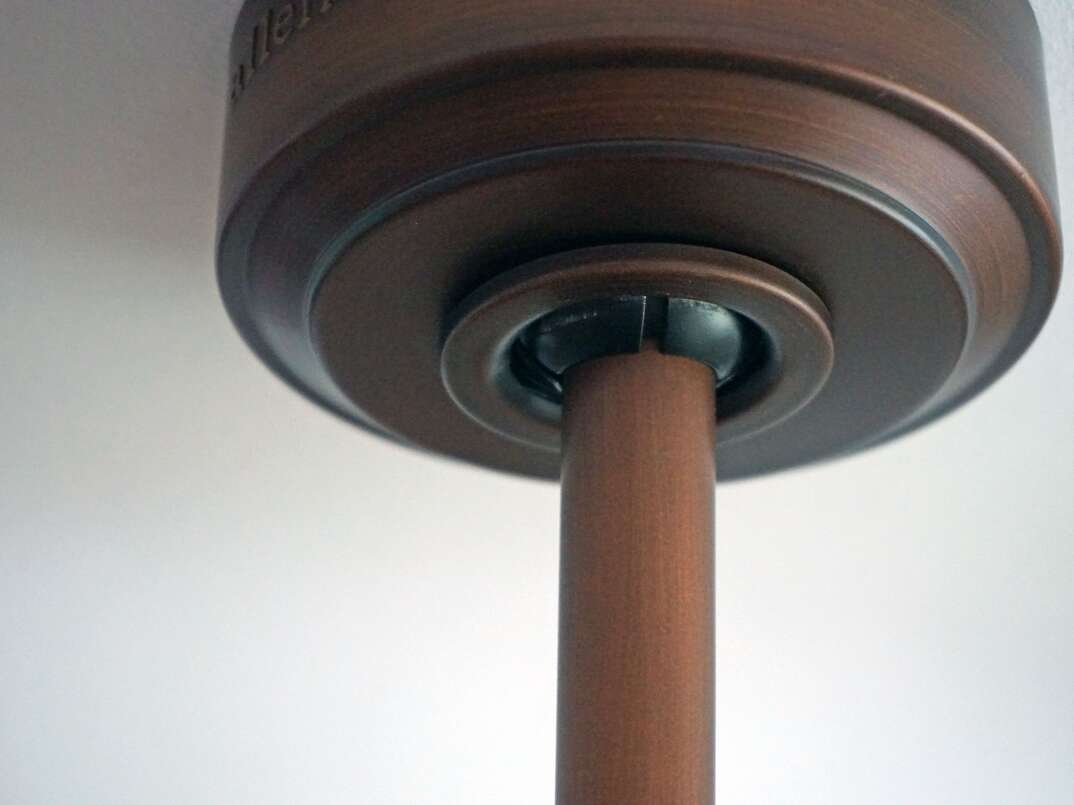 close up of a ceiling fan downrod