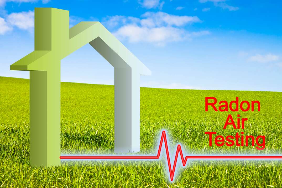 Graphic rendering shows the outline of a house against a blue sky and sitting atop an expanse of green grass with the words Radon Air Testing and a red line of measurement running underneath, house, radon inspection, radon testing, radon, testing, radon air testing, grass, green grass, blue sky, graphic, graphic rendering, sky, house, home, safety, air quality, air, environmental services