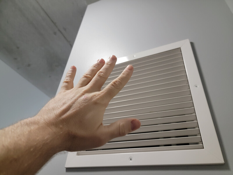 hand in front of air vent