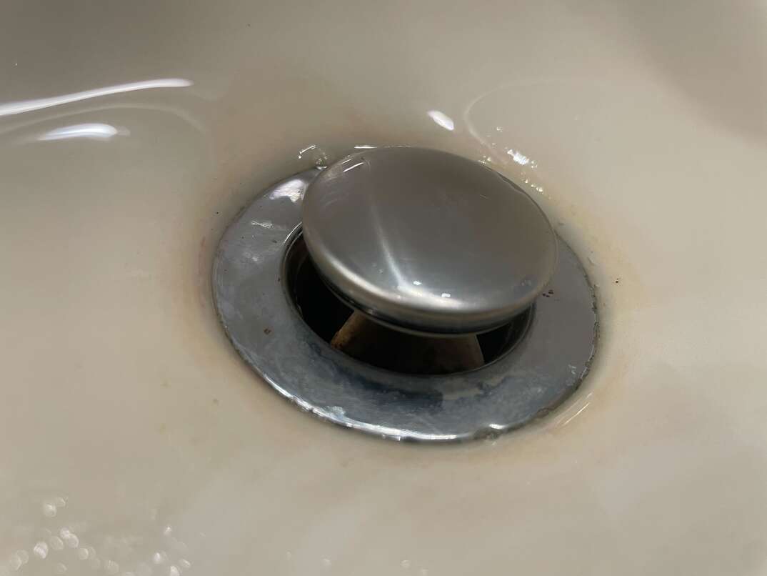 metal sink stopper in sink