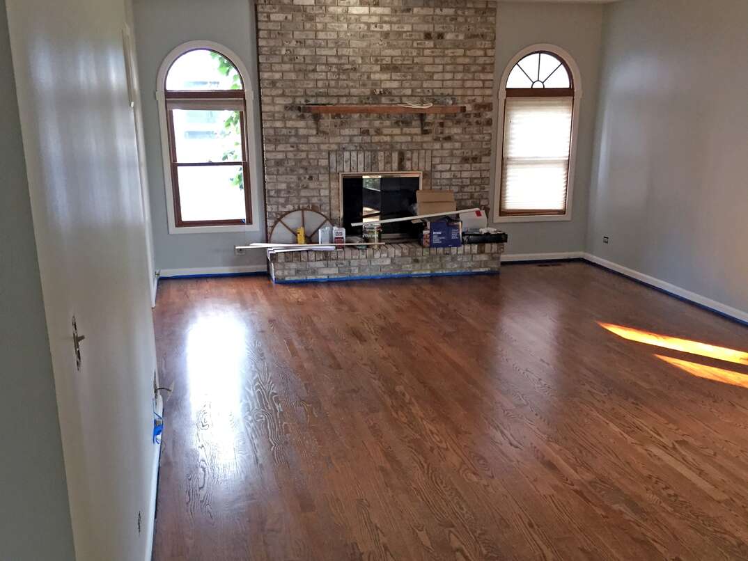 a freshly stained and polyurethaned hardwood floor 