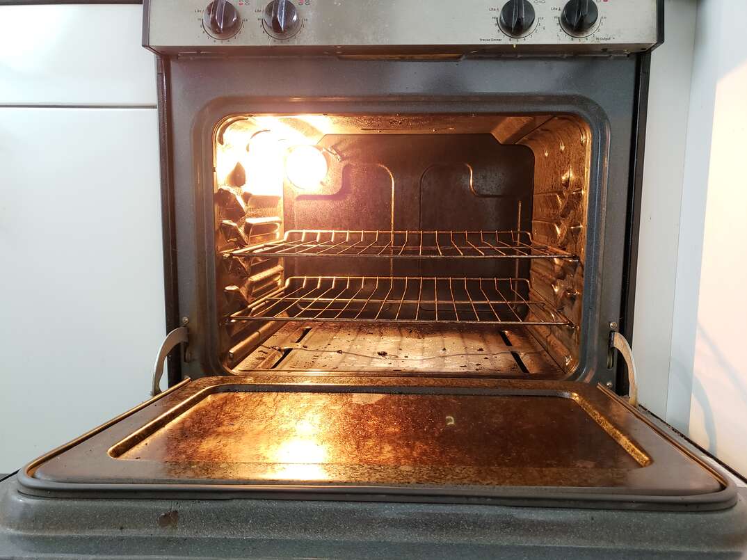 view inside a dirty oven