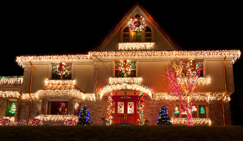 house decorated with holiday lights