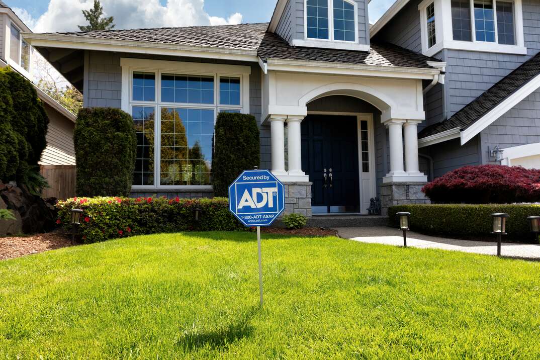 BOTHELL, WA/USA- May 19, 2022: ADT Home security sign displayed in front of home