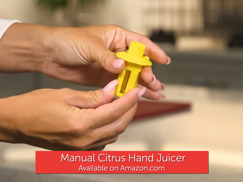 female hands holding and displaying a plastic juicer