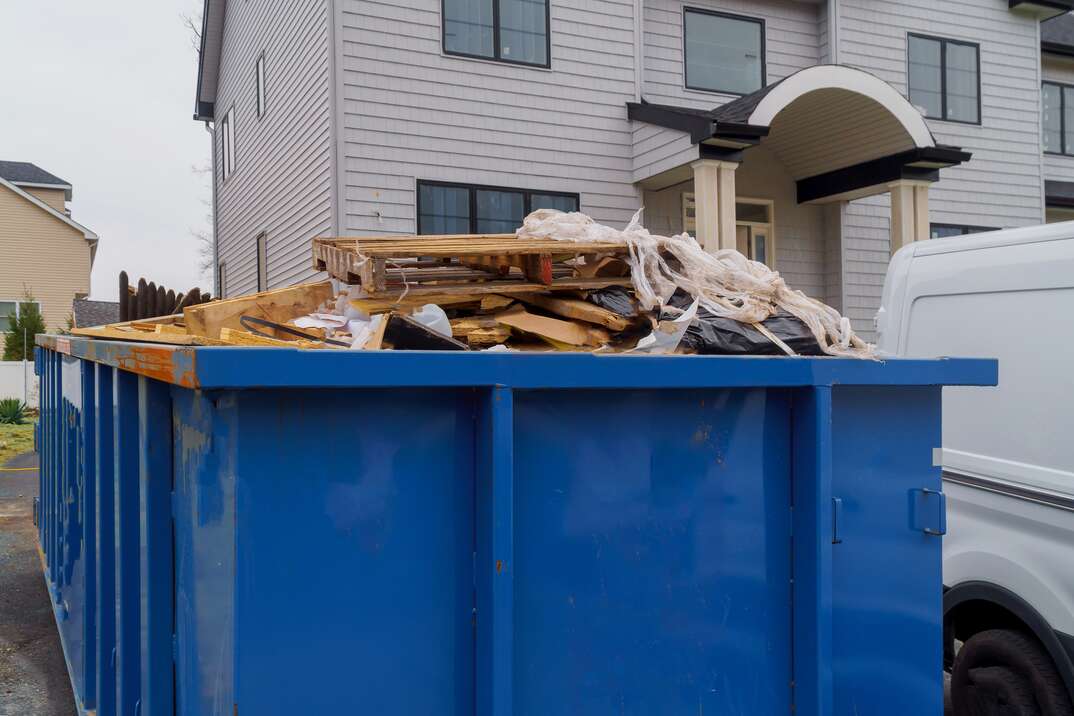 Dumpsters being full with garbage