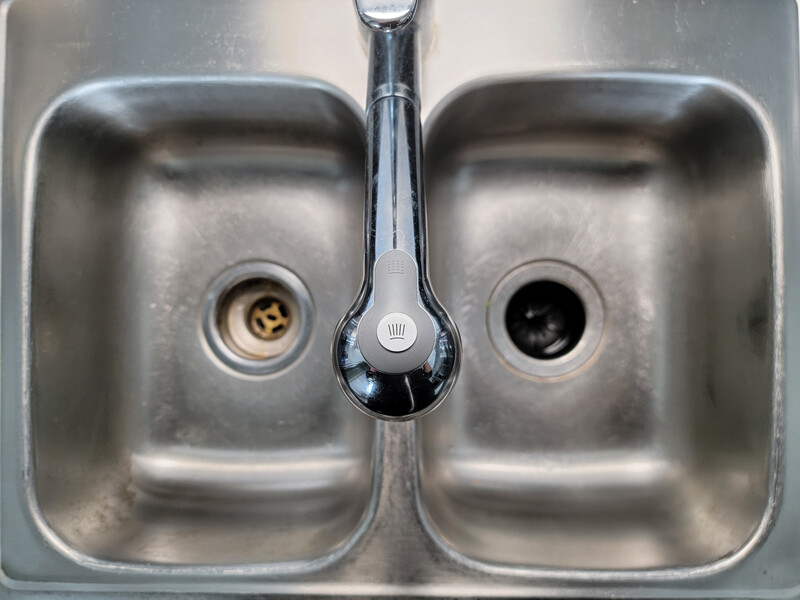 Baking soda poured to unclog drainage system at home