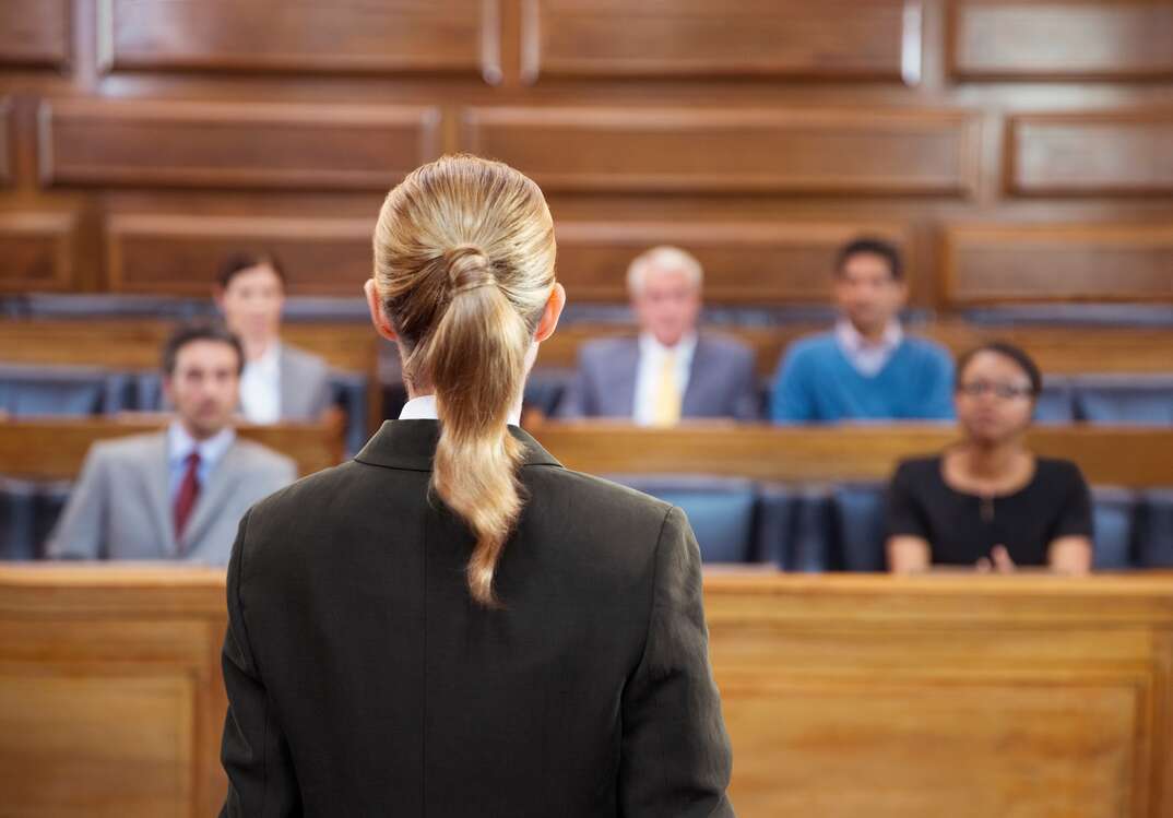 lawyer standing in front of a jury