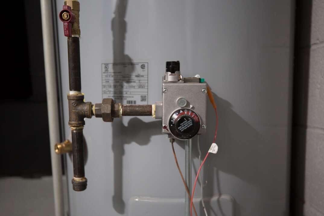 technician with water heater